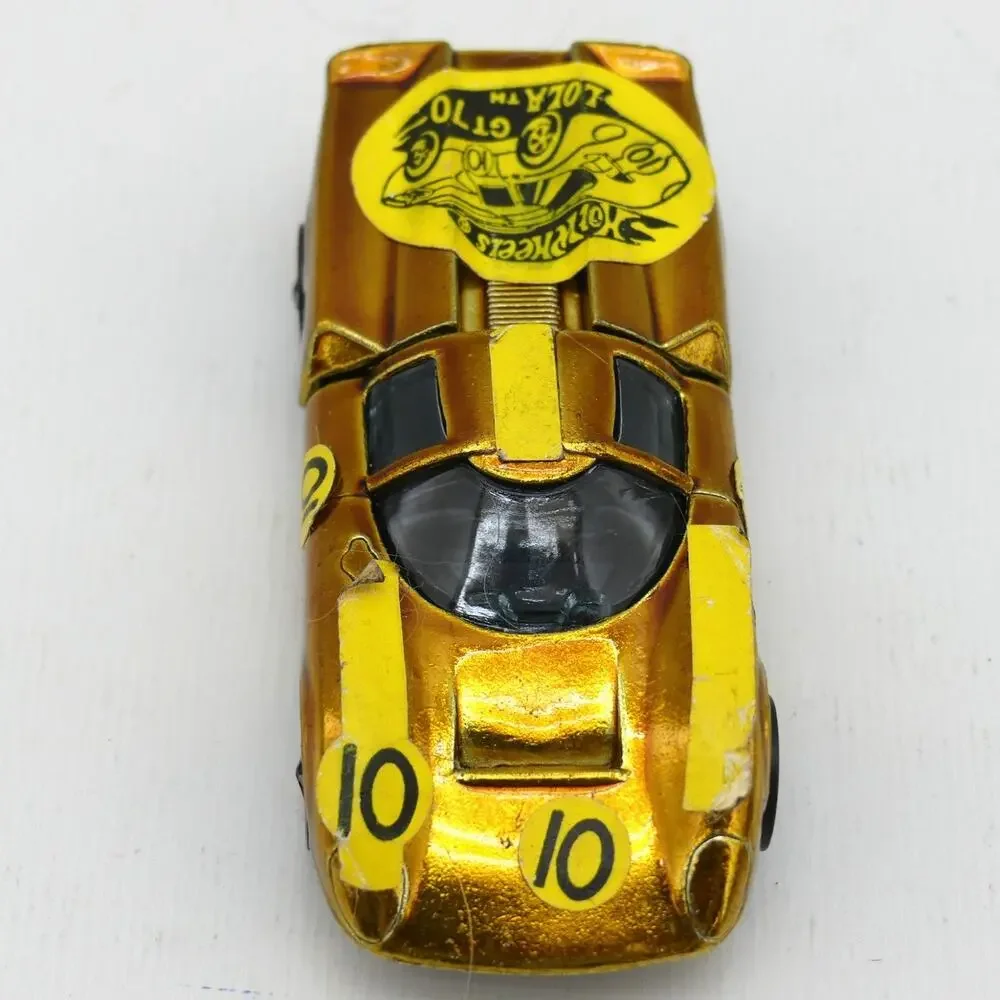 VTG 1968 Mattel Hot Wheels Lola GT-70 Gold Redline Diecast Car w/ Sticker